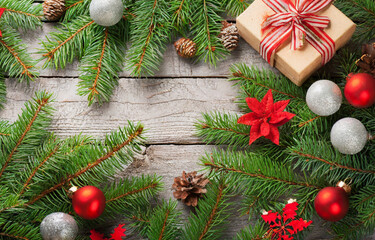 Obraz na płótnie Canvas Holiday Ornaments on Wood Texture, Christmas Decor on Wooden Background, Festive Decorations on Wooden Table