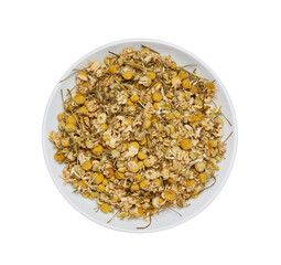 flat lay top view dry chamomile camomile flower leaves isolated in white bowl background. pile of dry chamomile camomile flower leaves isolated. dry chamomile or camomile flower leaves for healthy tea