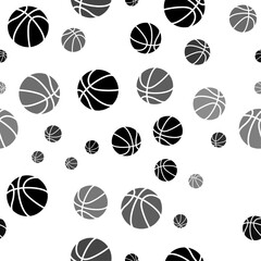 Seamless vector pattern with basketball symbols, creating a creative monochrome background with rotated elements. Vector illustration on white background