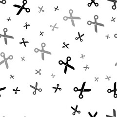 Seamless vector pattern with scissors symbols, creating a creative monochrome background with rotated elements. Illustration on transparent background