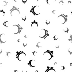 Seamless vector pattern with necklace symbols, creating a creative monochrome background with rotated elements. Vector illustration on white background