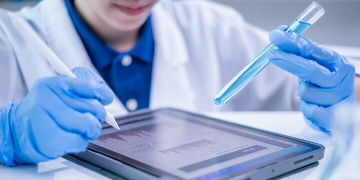 Woman scientist person research writing document science study datum in modern laboratory, professional female doctor working on medical test lab note report health technology development analysis