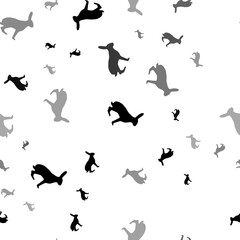 Seamless vector pattern with hare symbols, creating a creative monochrome background with rotated elements. Illustration on transparent background