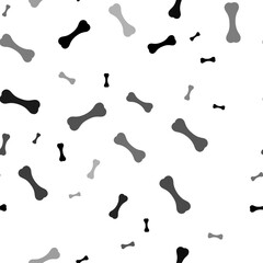 Seamless vector pattern with dog bone symbols, creating a creative monochrome background with rotated elements. Vector illustration on white background