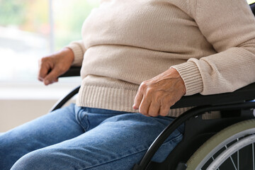 Senior woman in wheelchair at home, closeup