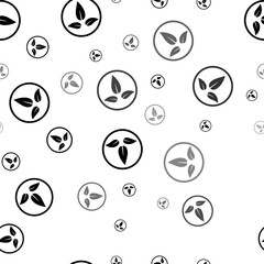 Seamless vector pattern with ecology symbols, creating a creative monochrome background with rotated elements. Illustration on transparent background