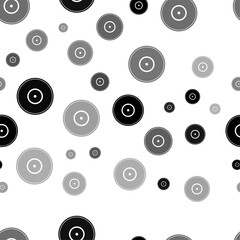 Seamless vector pattern with gramophone record symbols, creating a creative monochrome background with rotated elements. Vector illustration on white background
