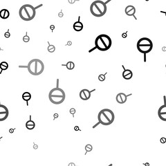 Seamless vector pattern with agender symbols, creating a creative monochrome background with rotated elements. Vector illustration on white background
