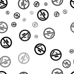 Seamless vector pattern with no gas symbols, creating a creative monochrome background with rotated elements. Vector illustration on white background