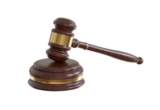 A wooden judge gavel. Auction hammer with gold on the stand. Law and justice system symbol