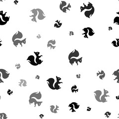 Seamless vector pattern with squirrel symbols, creating a creative monochrome background with rotated elements. Illustration on transparent background
