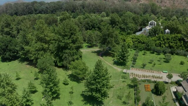 An aerial drone fly-through shot of the Temple of St. Petka of Bulgaria in Rupite, northeast of Petrich, which was built through the money provided by Baba Vanga.