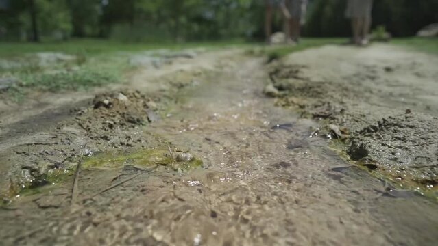 Following the flow of the clear mineral hot spring water known to have healed many people in St. Petka Church in the town of Rupite, Petrich, Bulgaria.