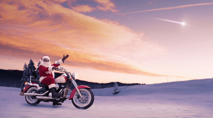 Fototapeta premium Rider Santa carrying Christmas gifts