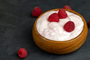 fresh yogurt with raspberry flavor, close up