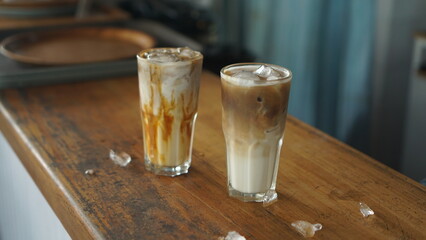 Coffee Latte Ice served on the wooden table.