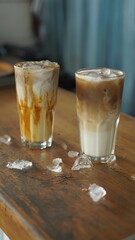 Coffee Latte Ice served on the wooden table.