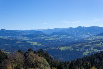 Fototapeta na wymiar Beautiful green Alp mountains and hills from Pfaender Mountain in Bregenz