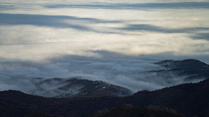 fog over the city. the city is in a fog. low cloud cover