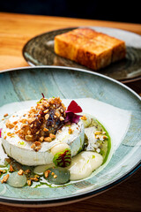 camembert cheese with nut and sauce