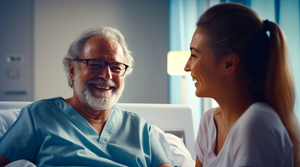 Fototapeta premium Nurse talking to patient on hospital bed in hospital room.