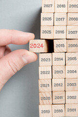 Wooden Blocks with New Year 2024 - 680434591