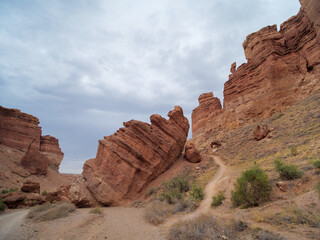 Charyn Canyon National Park. The road along the bottom of the Valley of Castles. Red rock formations formed as a result of erosion over millions of years. A small replica of the US Grand Canyon.
