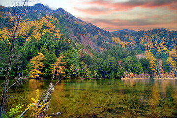 Idyllic landscape of Myojin pond at Hotaka Rear shrine in Kamikochi, Nagano, Japan (Japanese language meaning "Myojin Pond")