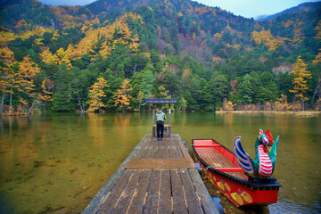 Idyllic landscape of Myojin pond at Hotaka Rear shrine in Kamikochi, Nagano, Japan (Japanese...