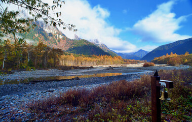 Kamikochi National Park in the Northern Japan Alps of Nagano Prefecture, Japan. Beautiful mountain in autumn leaf and Azusa river