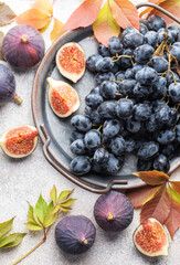 Fresh ripe figs and dark grapes
