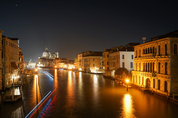 Fototapeta premium View of the Grand Canal and Basilica Santa Maria della Salute at night, Venice, Italy