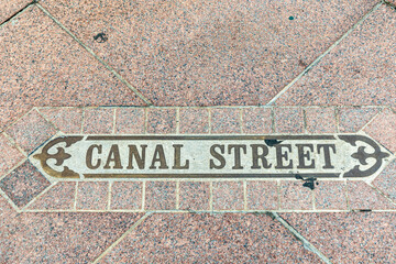 copper inlet canal street at sidewalk downtown New Orleans, Louisiana,