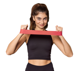 Caucasian athlete exercising with resistance band in studio
