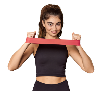 Caucasian athlete exercising with resistance band in studio