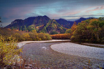 Kamikochi National Park in the Northern Japan Alps of Nagano Prefecture, Japan. Beautiful mountain in autumn leaf and Azusa river