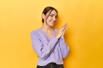 feeling energetic and comfortable, rubbing hands confident.