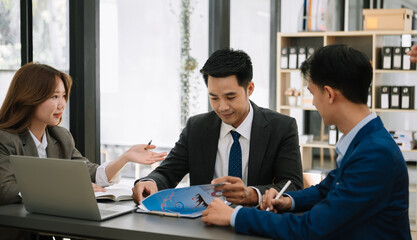  Young business creative team are brainstorming planning discussing while sitting in creative business discussing work in office..