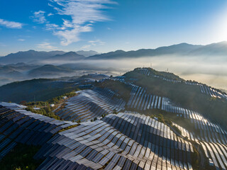 Aerial photography of solar photovoltaic panels on mountain top