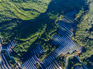 Aerial photography of solar photovoltaic panels on mountain top