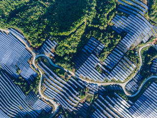 Aerial photography of solar photovoltaic panels on mountain top