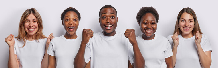Indoor shot of cheerful women and one man clench fists and celebrate success smile gladfully enjoy triumph dressed in casual t shirt isolated over white background. People body language concept