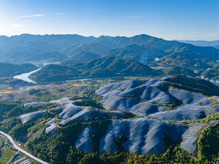 Aerial photography of solar photovoltaic panels on mountain top
