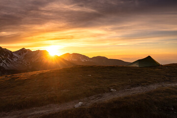 Fototapeta na wymiar Sunset over the rocky peaks in the High Tatras