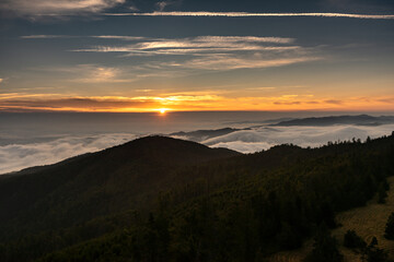 Sunset over the forested hills of the Beskids