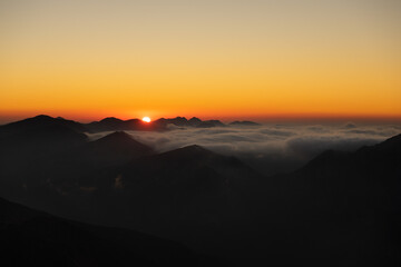 Sea of ​​clouds during sunset in the Tatra National Park