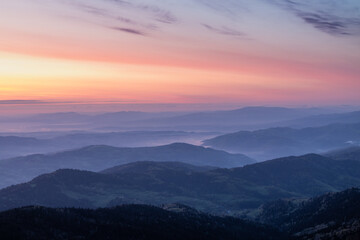 Fototapeta na wymiar Amazing colors of the sky during sunrise admired in the Beskids