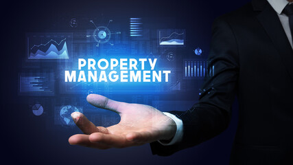 Hand of Businessman holding motivational message