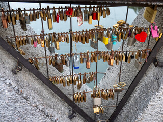 Bridge full of padlocks representing love and friendship in the famous old Navigli neighborhood in...