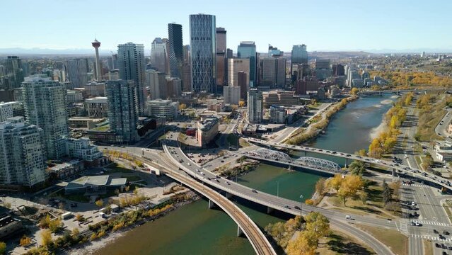 Calgary, Alberta, Canada - October 8 2023 : Downtown Calgary skyline and Bow River in autumn season. Aerial view of City of Calgary, Alberta, Canada.